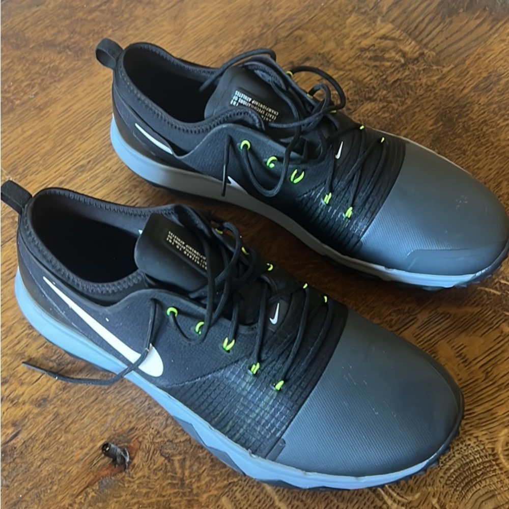 Nike golf shoes brand new size 11.5 black. Never worn.